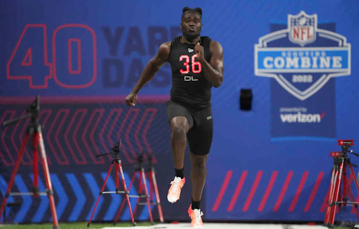 Mar 5, 2022; Indianapolis, IN, USA; Michigan defensive lineman David Ojabo (DL36) runs the 40-yard dash during the 2022 NFL Scouting Combine at Lucas Oil Stadium. Mandatory Credit: Kirby Lee-USA TODAY Sports